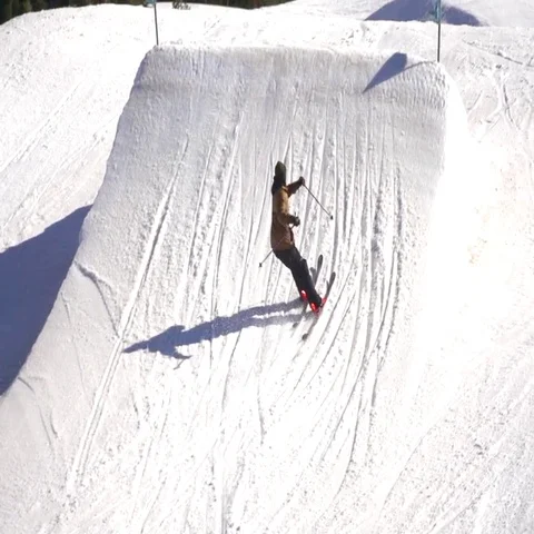 Ski jump slow motion, back roll 540 with tail grab. Stock Footage 69377580
