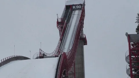 Ski jump tower in snowfall Stock Footage 70813277