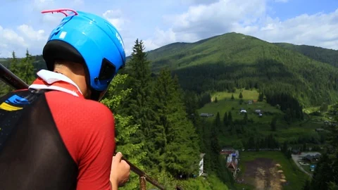 Ski jumper is getting ready for a jump in the training camp Stock Footage 98642996
