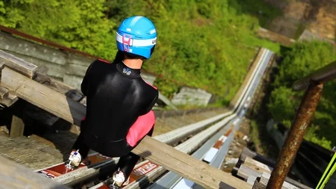 Ski jumper is getting ready for a jump in Carpathians Stock Footage 98643071