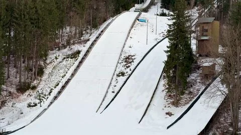 Ski Jumping Facility Set in a Stunning Winter Landscape Surrounded by SnowC.. Stock Photos