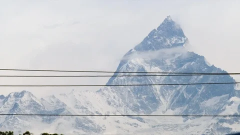 Ski lift cables in front of snow covered mountains Stock Footage 113255325