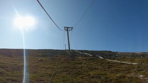 Ski lift cables lowered down for summer Stock Footage 117785335