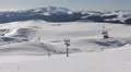 Ski Lift Chairlift Operate Snowboarder Skier Passing Snow Covered Slope Mountain HD Footage