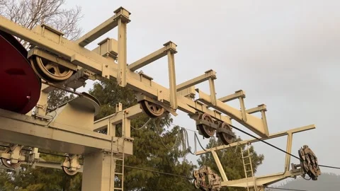 Ski Lift Close Up of Rollers, Pulleys, and wheel rotating at high speed. Stock Footage 296882816