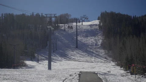 Ski lift doesn't work on forest and blue sky background. Stock Footage 144779621