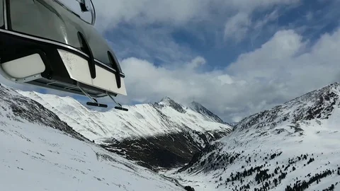 Ski lift going up the mountain. Video stock 123553716