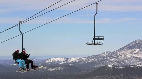 Ski LIft with mountains in background Stock Footage 40521404