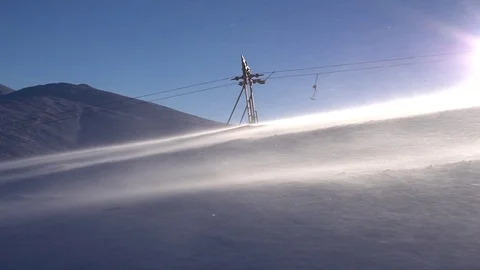 Ski lift moving up to the mountain. Video stock 74802283