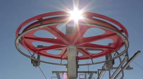 Ski lift operating in the mountains, backlit 1  chairlift Stock Footage 54363560