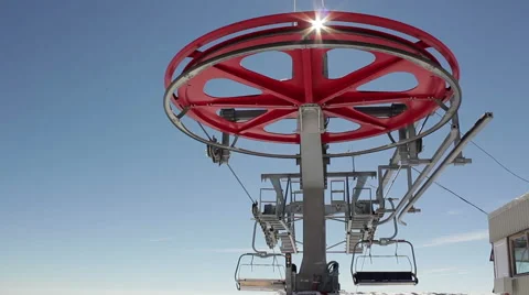Ski lift operating in the mountains, backlit 2  chairlift Stock Footage 54363565