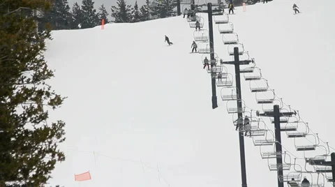 Ski Lift Snowboarders Stock Footage