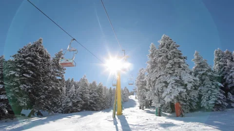 Ski lift with sun rays Stock Footage 35476328