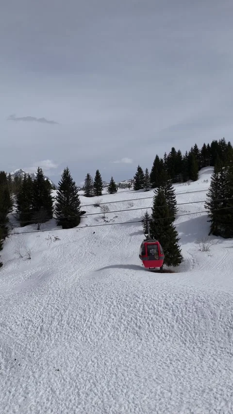Ski lifts going up and down in Courchevel ski resort over snowy mountains Stock Footage 334320272