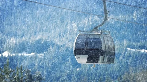 Ski Lifts Passing With Snow Falling Stock Footage 64146793