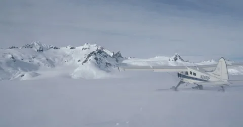 Ski Plane Taking Off From Glacier Stock Footage 66556224