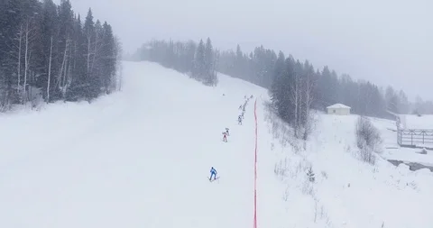 Ski race competition in covered snow winter forest. Stock Footage 103584902
