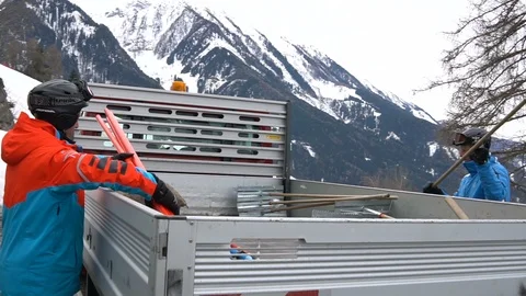 Ski Race Setup Crew in Mountains Stock Footage 87734606