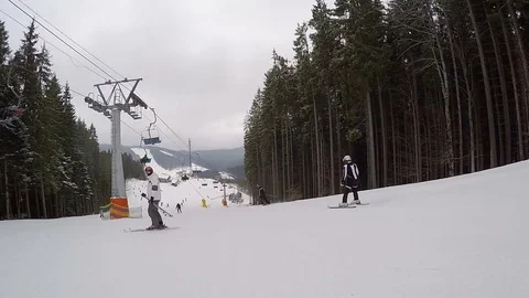 Ski resort. Descent down the ski slope. Video stock 74698897