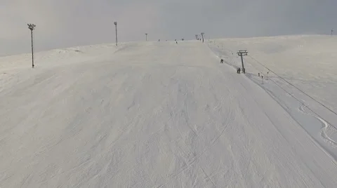 Ski resort. Flying towards skiers. Stock Footage 59593292