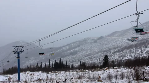Ski resort in mountains, empty ski lift, no one came to ride, everyone at home Stock Footage 132737965