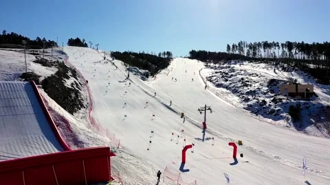 Ski resort in the mountains Stock Footage 239103238