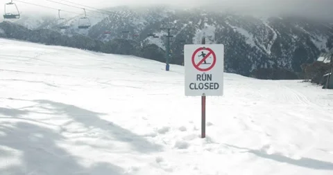 Ski Run Closed Sign in Winter Snow During Covid 19 Shutdown Stock Footage 137854011