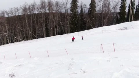 Ski school. The instructor teaches the child to ski. Stock Footage 148424661