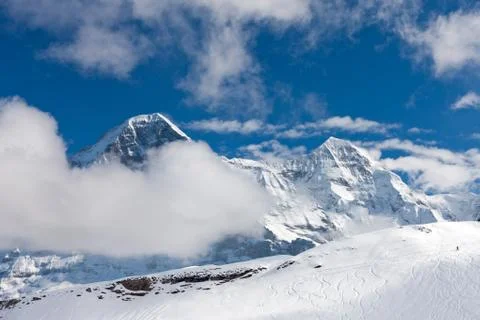 Ski slope in the background of Mount Eiger. Stock Photos