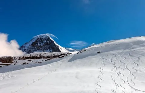 Ski slope in the background of Mount Eiger. Stock Photos