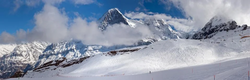 Ski slope in the background of Mount Eiger. Stock Photos