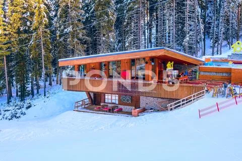 Ski slope in Bansko, Bulgaria and skiers Stock Photos