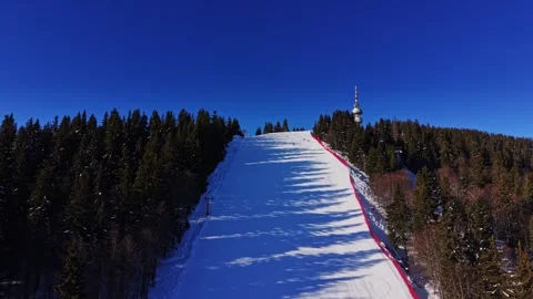Ski slope in the Carpathians during winter sunlight in Bulgaria Stock Footage 337987667