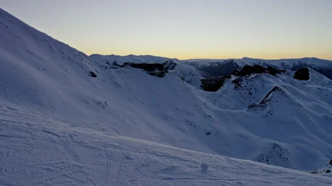 Ski slope in pre sunrise light hand held Stock Footage 159695044