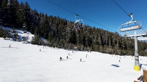 Ski Slope Time-Lapse 4K during sunny beautfiul weather, ski traffic Stock Footage 245109132