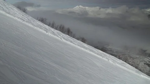 Ski slopes on North slope Aibga Ridge Western Caucasus at all-season resort Stock Footage 73119022