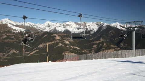 Ski slopes snow mountains sun Stock Footage