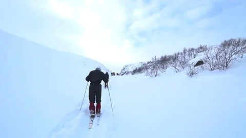 Ski tour in the mountains Stock Footage 84510769