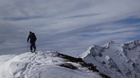 Ski touring on mountain peak Video stock 49001608