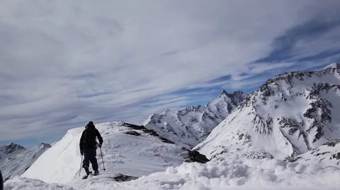 Ski touring on mountain peak Video stock 49007144