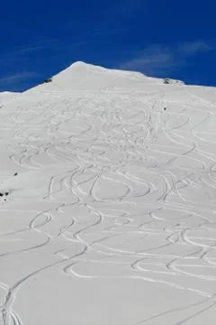 Ski tracks on mountainside Stock Photos