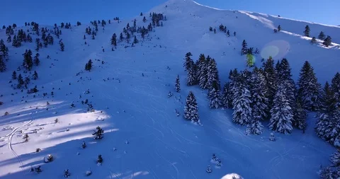 Ski tracks in shadow on steep off piste slope Stock Footage 93455631