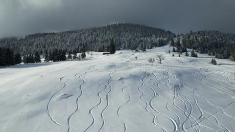 Ski tracks on the snow in alpine setting Stock Footage 296642193