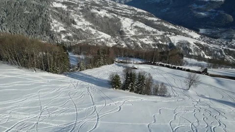 Ski tracks on the snow in alpine setting Stock Footage 296644588