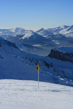 Ski Warning Sign on Snowy Slope in Morzine Avoriaz French Alps Stock Photos