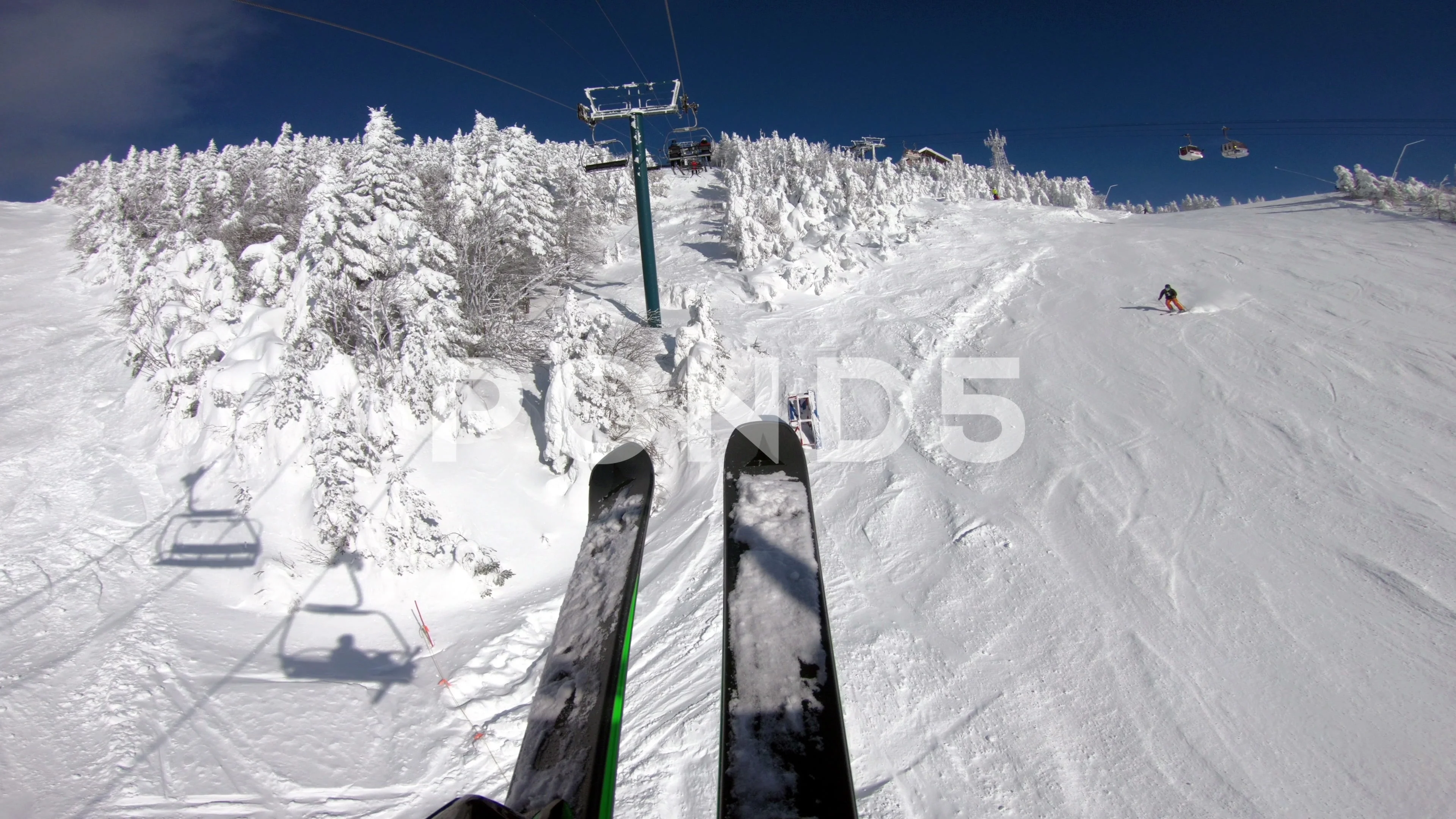 Ski winter vacation concept video. Ski lift and gondola. First person view  POV