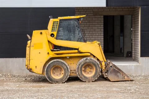 Skid loader on construction site Stock Photos