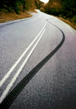 Skid mark on empty road Stock Photos