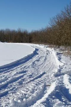 Skid marks into a snowscape Stock Photos