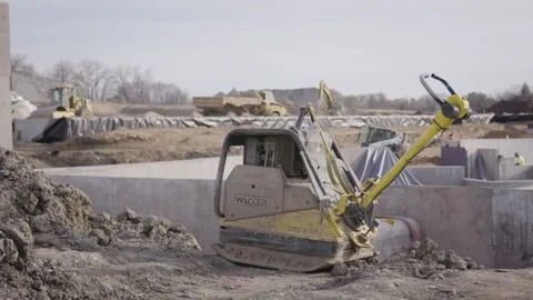 Skid-Steer Loader At Heavy Equipment Construction Site Stock Footage 144904920